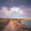 Tabarca island Alicante Spain on July 2020: Nova Tabarca is the largest island in the Valencian Community, and the smallest permanently inhabited islet in Spain. It is known for its marine reserve. The lighthouse by sunset.