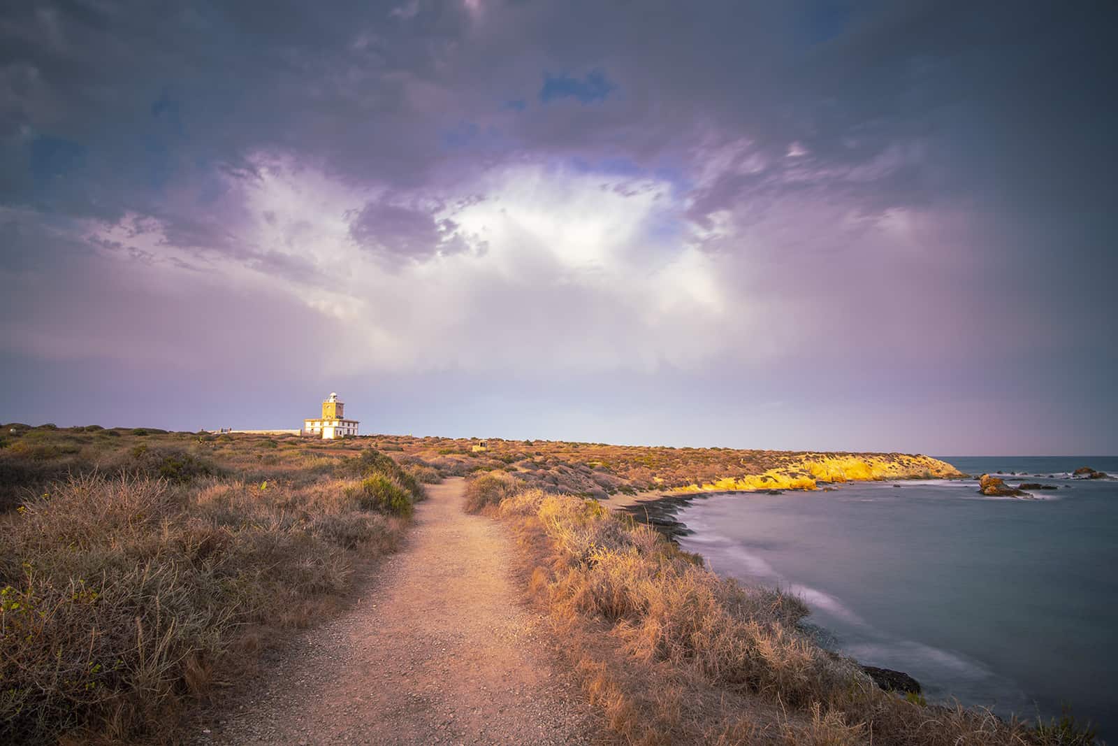 Tabarca island Alicante Spain on July 2020: Nova Tabarca is the largest island in the Valencian Community, and the smallest permanently inhabited islet in Spain. It is known for its marine reserve. The lighthouse by sunset.